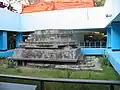 An Aztec sculpture of Ehecatl unearthed in 1967 during the construction of the Metro, which remains in the center of the Metro Pino Suárez station]