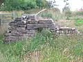 Gable end and the fireplace of the office.
