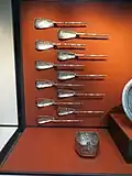 Eleven spoons with running animals and censer from the treasure