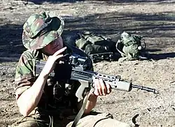Royal Marines Commando wearing the former No.8: Temperate Combat Dress.