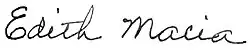 Cursive signature in ink