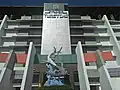Front of GBT and statue of shark-crocodile