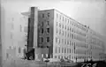 Merrill's Wharf as it appeared at an unknown point in the past that must have been prior to at least 1960, at which point the windows were blocked to convert the building to cold storage.