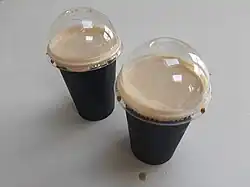 Two pints of stout delivered fresh from a pub. The delivery service of pints was a novel innovation of the pandemic in Ireland. The Garda Síochána—upon taking legal advice—confirmed that there was no law against the service.[144][145]