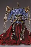 View of the reverse of a Ming dynasty empress' phoenix crown with 3 dragons and 3 phoenixes.