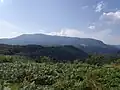 Plesa peak 1,470 metres (4,820&nbsp;ft) seen from Cornetul mountain.