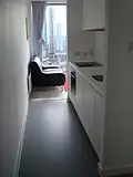 Interior of one of the single apartments showing the kitchen area.