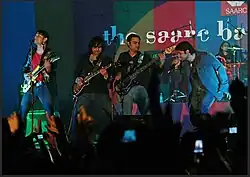 Maqsood in center left.