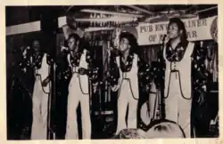 A promotional image of the group in the Pub Entertainer of the Year competition